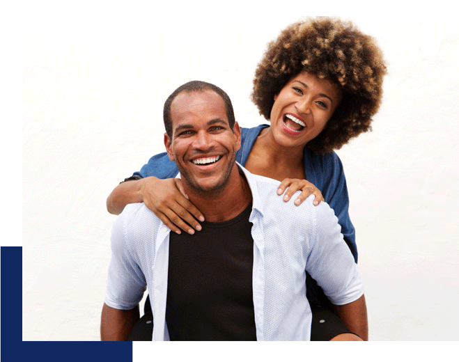 A smiling couple. The man gives the woman a piggy back ride. This image represents how ADHD therapy in Tustin, CA can help you find joy in your home.
